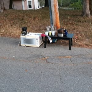The incident is under investigation by the Rowley Police Department and Transit Police. Officers on-scene made note of a pile of discarded kitchen appliances and items on Depot Way. It is believed that someone took the item from the pile of discarded "free" items and placed it on the bench. (Rowley Police Department Photo)